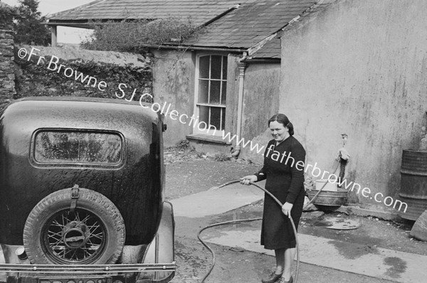 ESTHER MURPHY WASHING CANON'S CAR